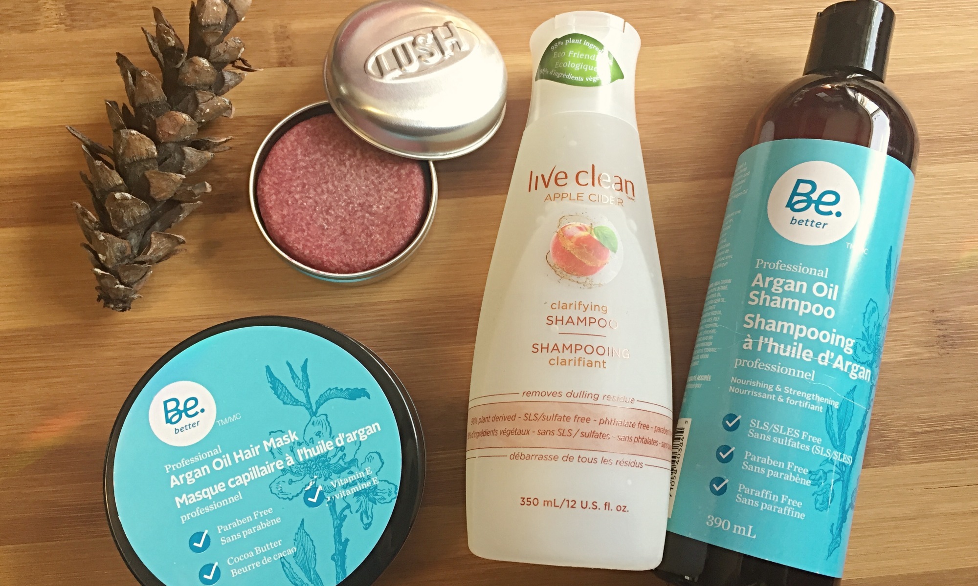 An image of a selection of non-toxic hair care products from brands such as Live Clean, Be.Better, and Lush.
